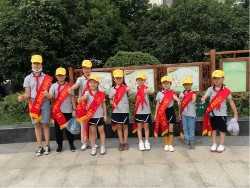 小手拉大手 共创文明城 南京市金陵小学联合和园社区开展志愿服务活动 二